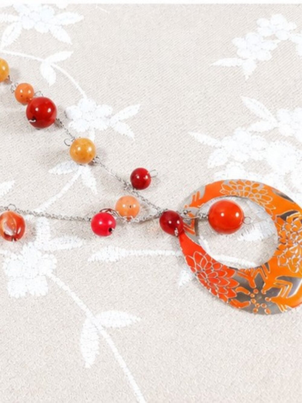 Handcrafted, One-of-a-kind, Orange floral pendant with warm-tone beads on chain
